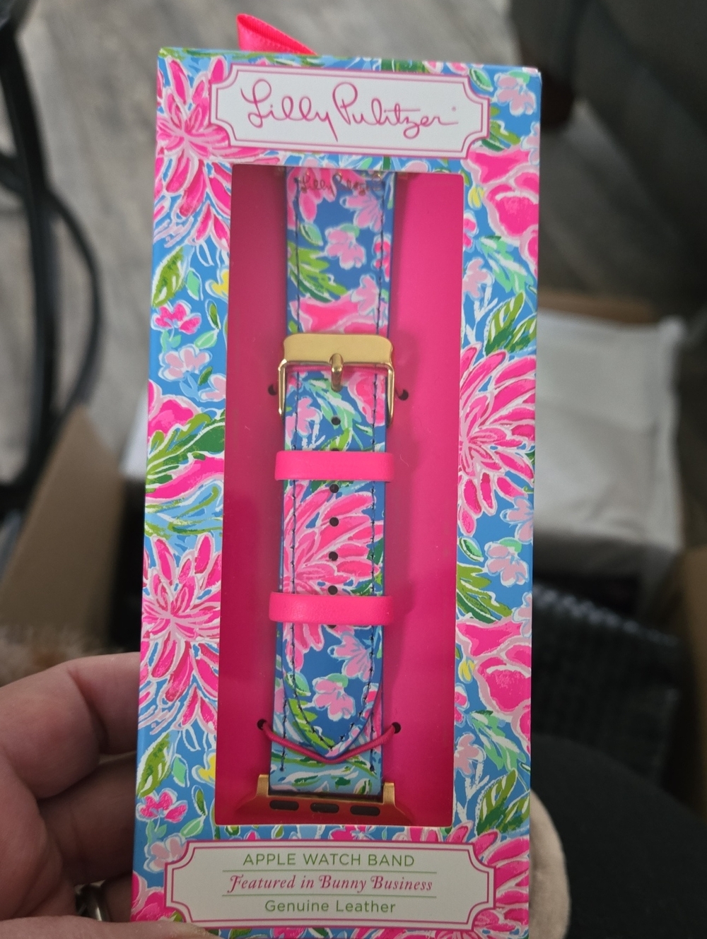 Lilly Pulitzer Pink and Blue Floral Leather Apple Watch Band with Gold Hardware.